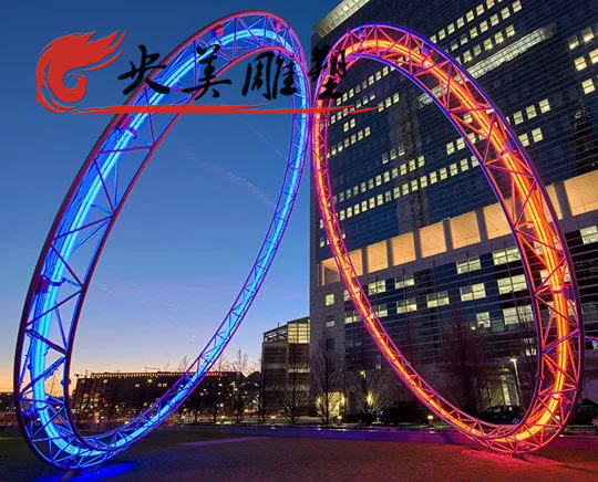 廣場擺放不銹鋼發光鏤空圓環景觀雕塑圖片 廣場擺放不銹鋼發光鏤空圓環景觀雕塑圖片